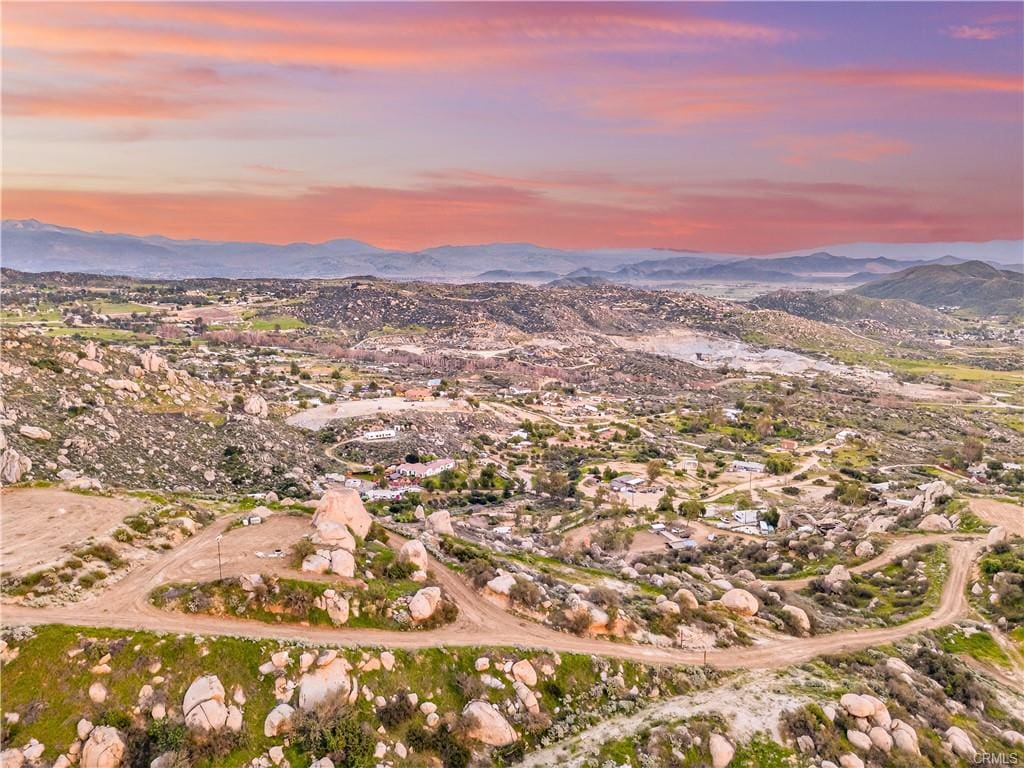 Aerial view of 13.9 acre land for sale in Homeland CA with panoramic views and usable terrain