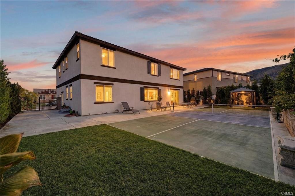 Backyard with regulation-size sports court at 36275 Firelight in Wildomar CA sold $25K over list price