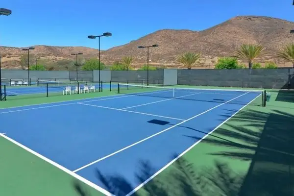 Tennis courts with mountain views at The Oasis in Menifee
