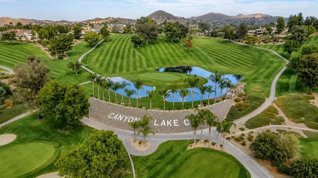 Aerial view of the Canyon Lake golf course fairways and country club entrance, Canyon Lake, California
