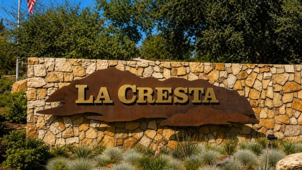 La Cresta stone entrance monument with the hillside emblem in Murrieta, California