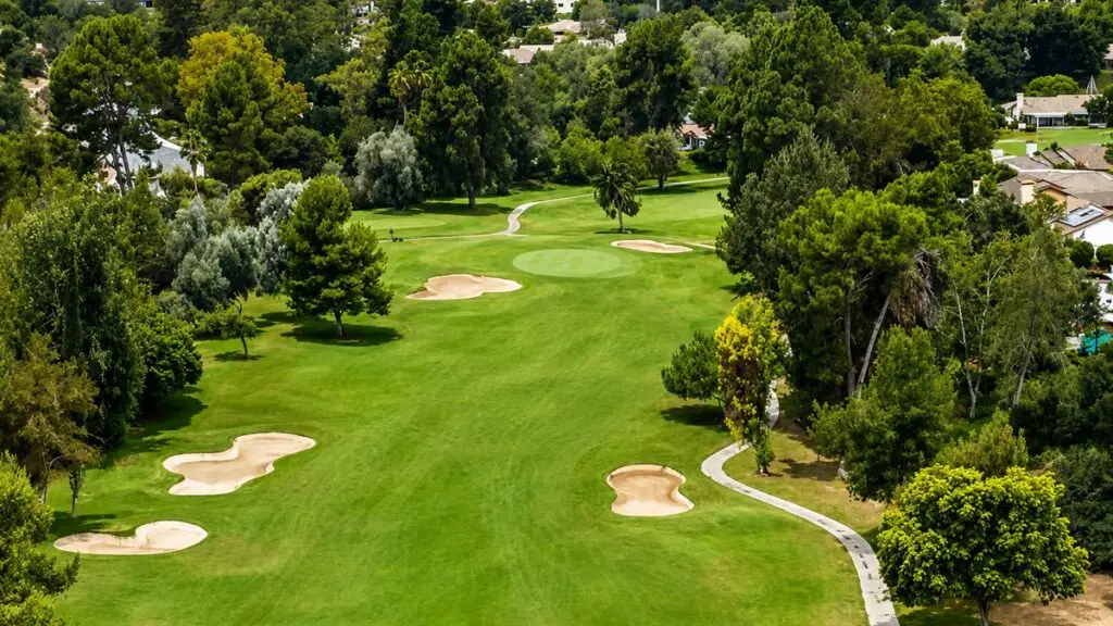 Mature oaks and open green fairways in the Live Oak Park area of Fallbrook, California